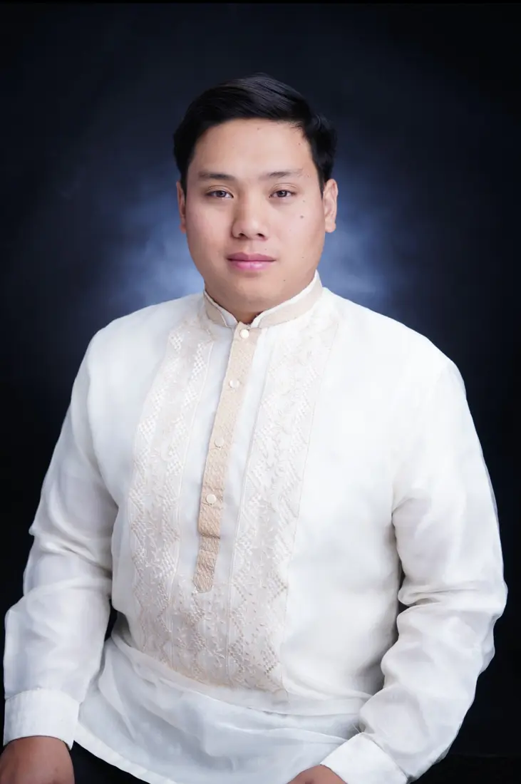 Formal portrait of Frank Ong in a barong